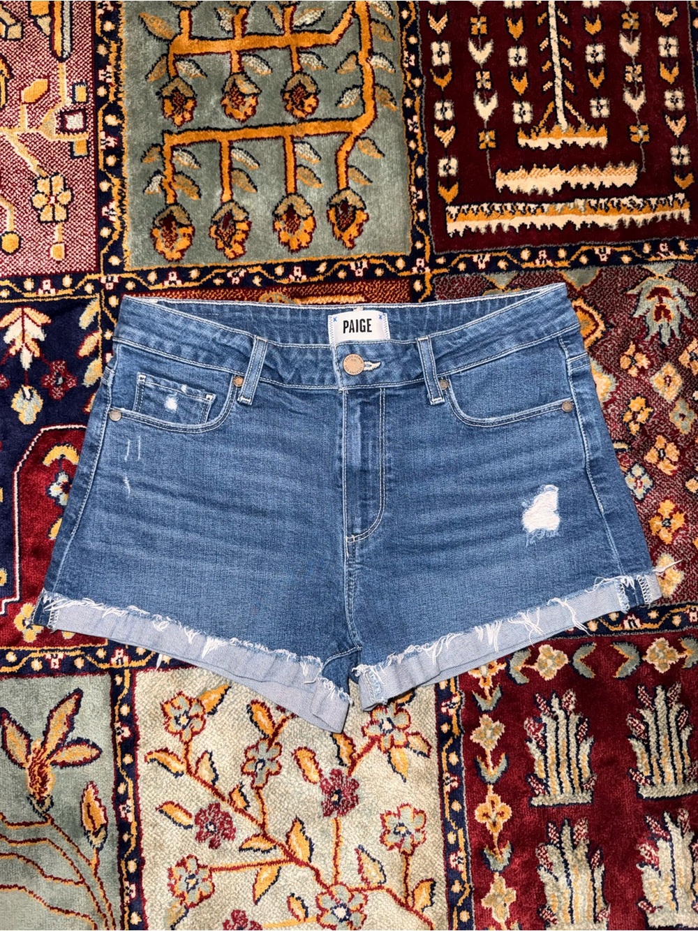 PAIGE Medium Blue Distressed Denim Shorts